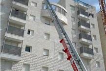 תמונה שצולמה להמחשת העבודות של כלב מנוף הרמה בירושלים - 2 העלאת חומרי בניין