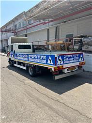 תמונה של איגור משייב לימודי נהיגה על משאית